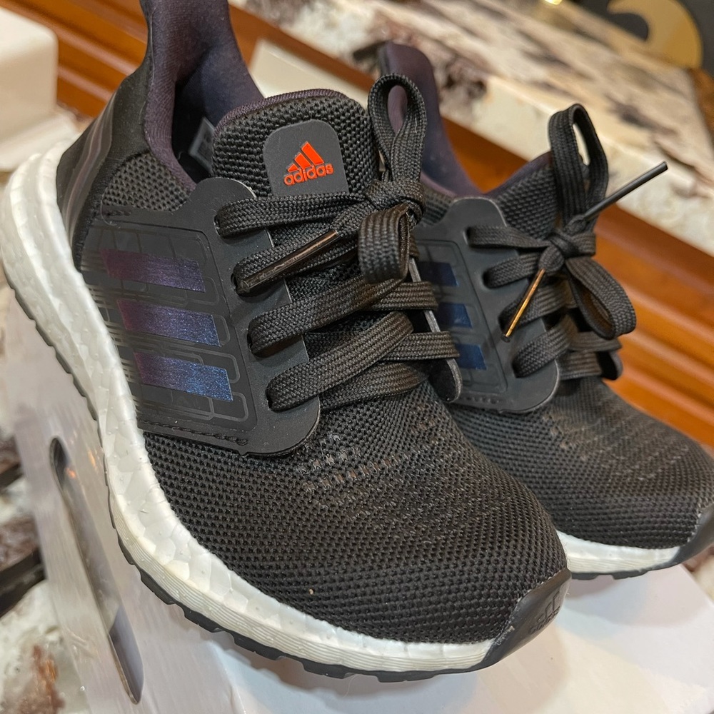 Boys 11k us black adidas ultra boost shoe. Black